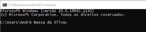 Na imagem é apresentado a tela do `cmd` com o texto: Microsoft Windows versão 10.0.19042.1110 Microsoft Corporation. Todos os direitos reservados. C:\Users\André Bessa da Silva>.